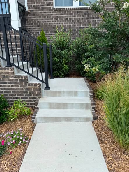 Before cleaning concrete steps and landing near landscaping